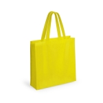 Saco de non-woven laminado de acabamento mate 110 g/m2 Holdall cor amarelo primeira vista